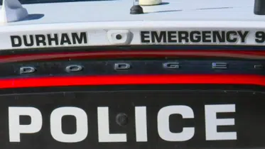 Man killed while crossing road in Durham, police searching for driver