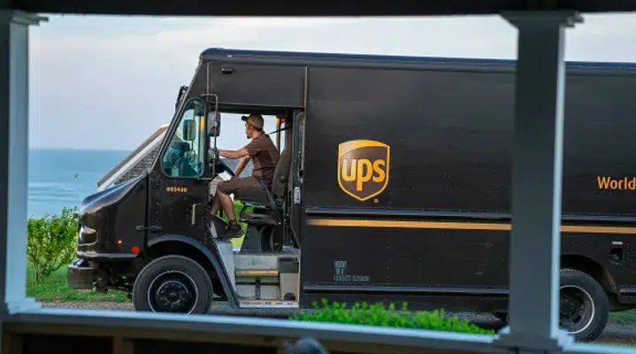 UPS announces 12,000 job cuts, says package volume slipped last quarter